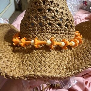Straw Cowboy Hat with Puakenikeni and Pikake Flower hat lei.